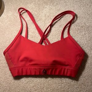 Red-Orange Reebok workout top